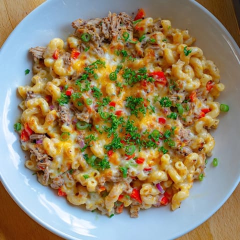 A close-up of a richly flavored BBQ Rib Macaroni Skillet, ready to be served hot.