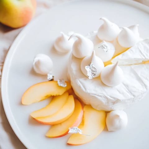 Heavenly white peaches, meringue kisses, and brie combine in this beautiful The Pearly Gates appetizer.