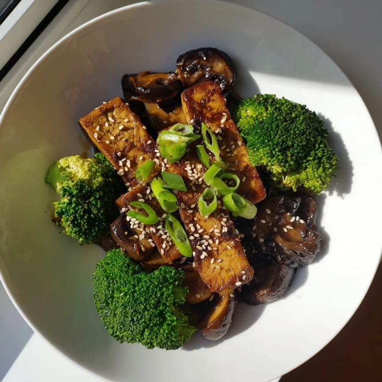 Imagine tender Sautéed Tofu Steak, coated in a delightful, flavorful sauce with fresh vegetables.