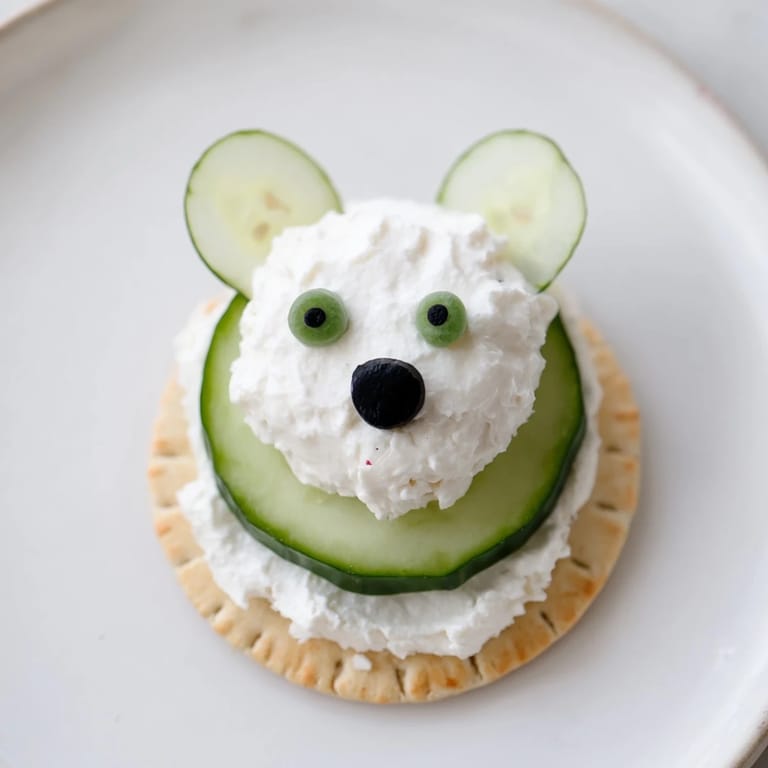 Enjoy the whimsical look of these savory Polar Bear Iceberg Cracker Stacks, a delightful party snack with crisp flavors.