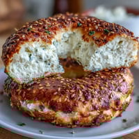 Golden cottage cheese bagels with everything bagel seasoning, freshly baked and ready to enjoy warm with your favorite toppings.